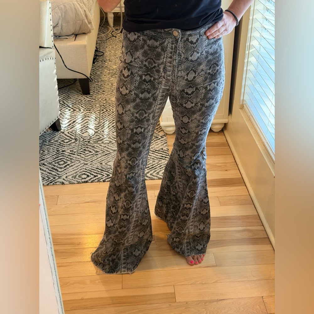 Free People We The Free Just Float On flare jeans in a gray snake print. - Picture 2 of 5
